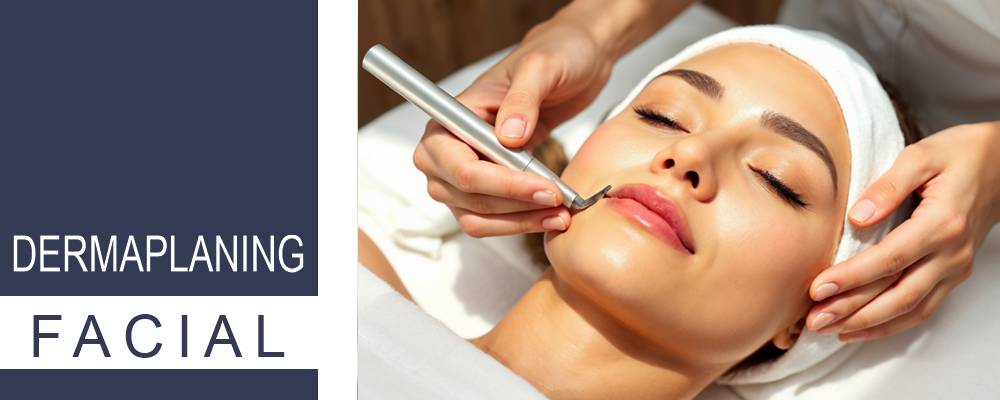 A skilled esthetician performing a dermaplaning facial in a calming spa atmosphere, enhancing the client's skin.