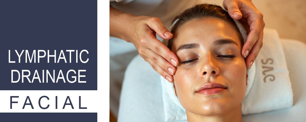 A woman relaxes during a lymphatic drainage facial, her face being washed to stimulate circulation and detoxification.